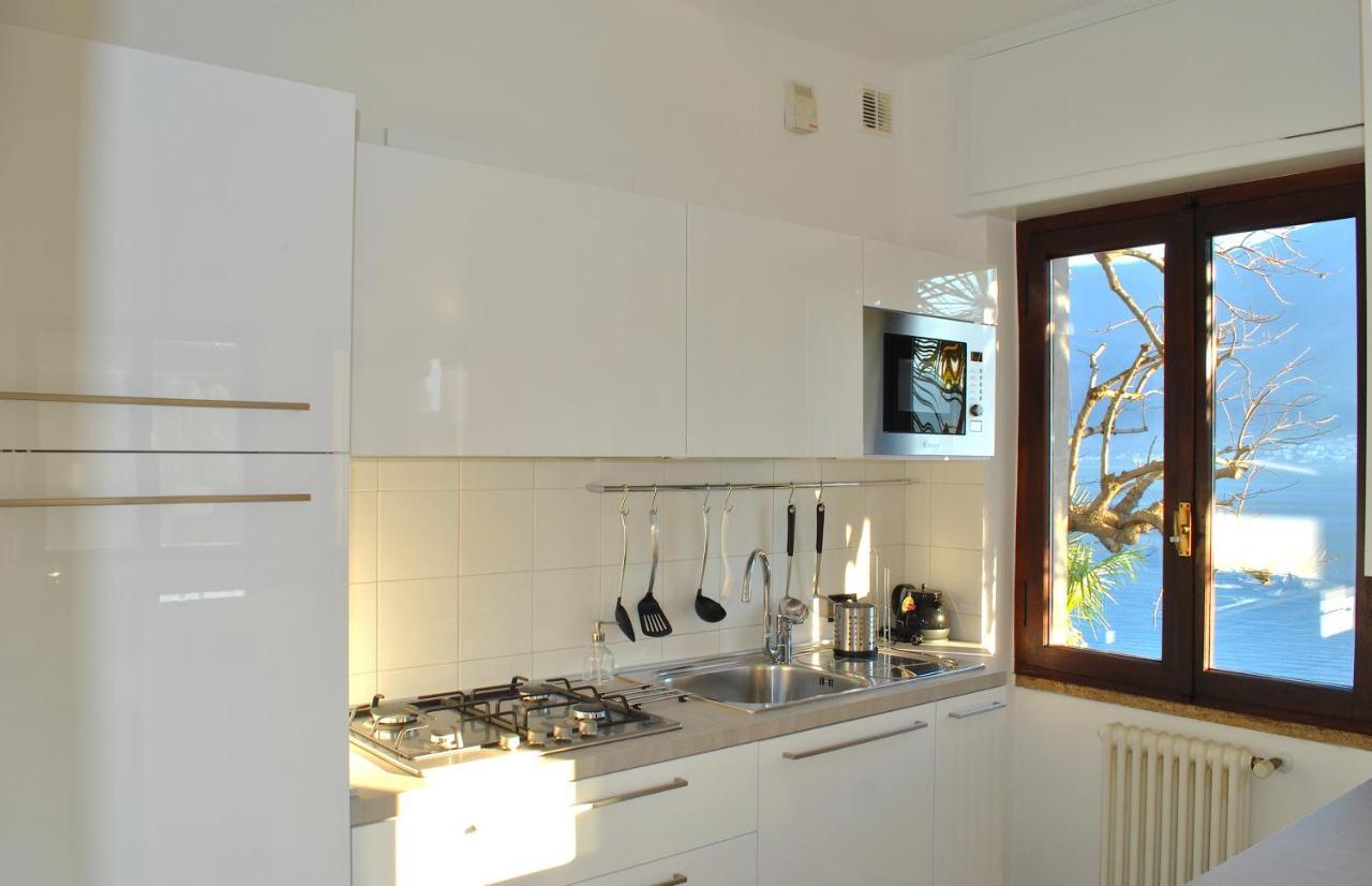 Apartment The Palm With Garden Sala Comacina Buitenkant foto