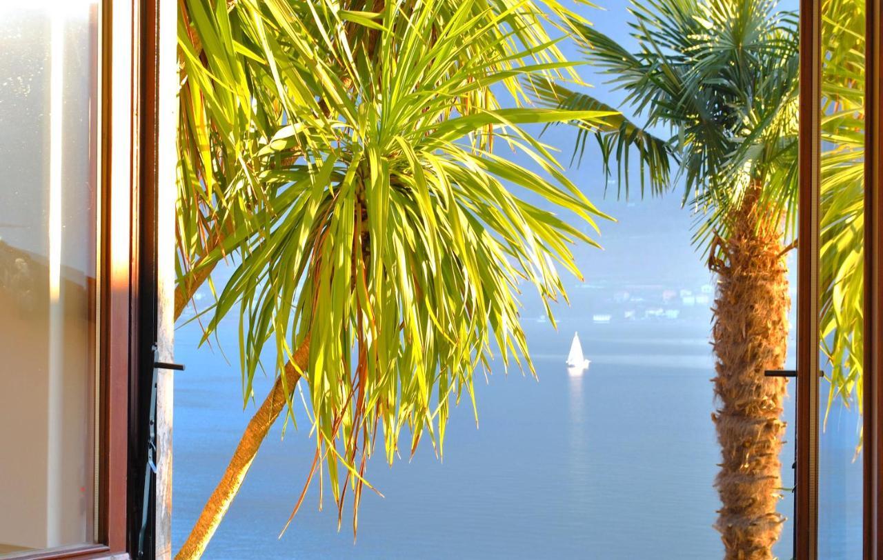 Apartment The Palm With Garden Sala Comacina Buitenkant foto