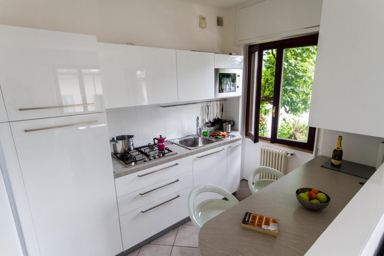 Apartment The Palm With Garden Sala Comacina Buitenkant foto